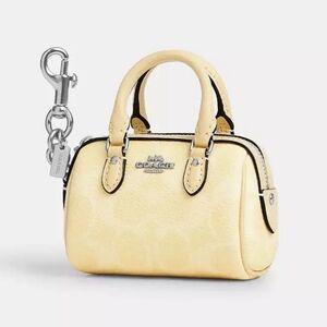 *NWT* COACH Mini Rowan Bag Charm in Signature Canvas, Color - Hay